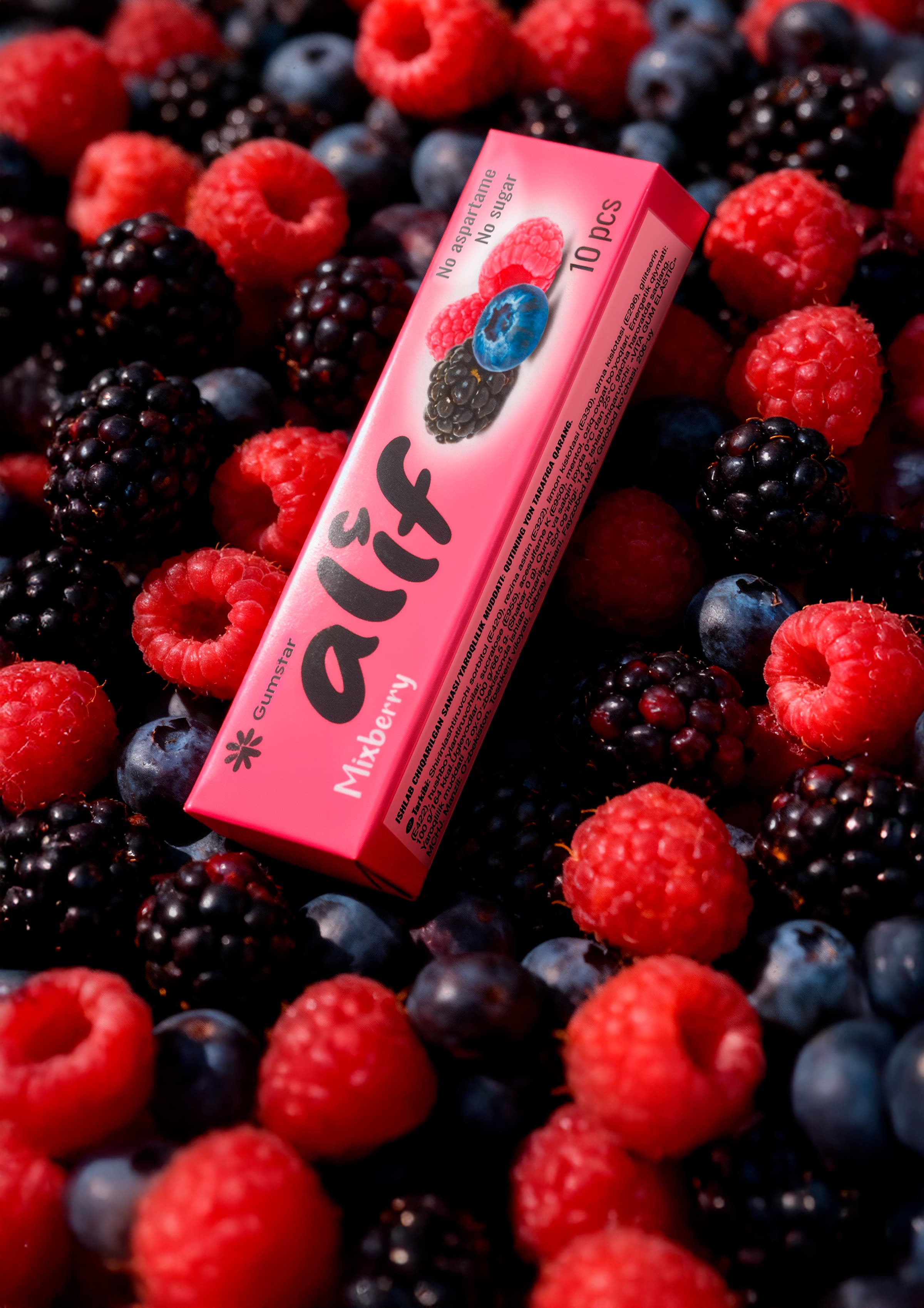 Alif mixberry gum surrounded by berries